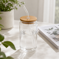 Venta al por mayor directa de fábrica: Vaso de vidrio transparente de 16 oz personalizado para sublimación con tapa de bambú y pajita de vidrio, ideal para regalos de eventos y cafeterías.