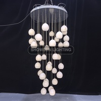 Lustre moderne de luxe créatif en pierre d'albâtre ronde pour salon, restaurant, escalier, décoration de la maison, luminaire suspendu