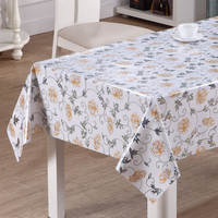Nappe en vinyle imprimée au laser RNPT avec des motifs floraux argentés sur un fond blanc en PVC et en tissu pour la salle à manger à domicile