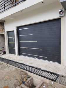Portes de <span class=keywords><strong>garage</strong></span> sectionnelles contemporaines en acier Automatisation moderne et surface finie pour villa Portes de <span class=keywords><strong>garage</strong></span> modernes isolées - Product Image 3