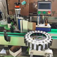 Machine d'étiquetage automatique électrique de bureau de haute précision pour bouteilles et canettes, distributeur professionnel d'autocollants en plastique personnalisés