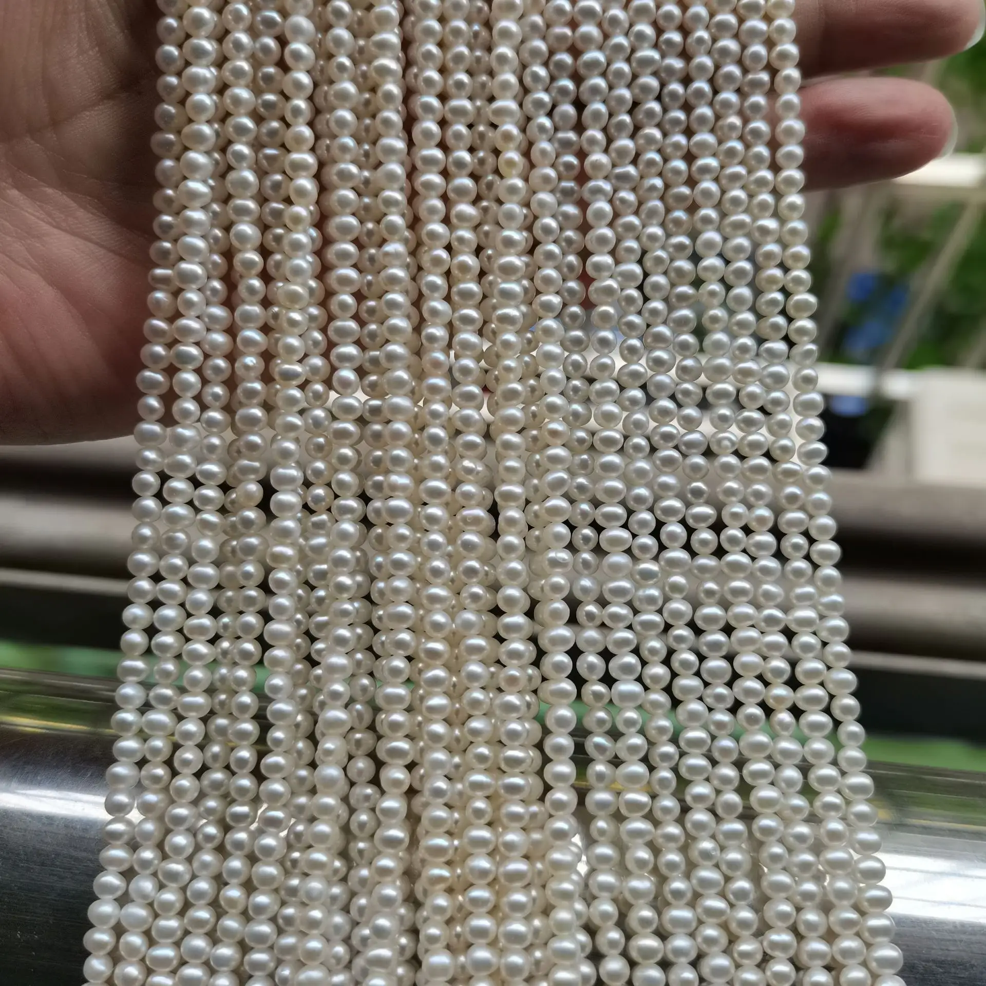 Grosir Kualitas Tinggi Mutiara Kecil 3-4Mm Alami Segar Air Putih Oval Telur Bentuk Kalung Manik-manik Mutiara