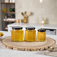 Grosir kustom logo heksagonal Jam kaca botol madu botol makanan dapur dengan tutup logam