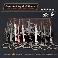 Vente en gros d'armes chaudes Vendre une gamme complète d'armes à feu Modèles d'armes Artisanat en métal Porte-clés Pendentifs Jouets pour enfants