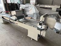 Venta directa de fábrica Máquina de corte oblicua doble de aluminio CNC de alta calidad Nueva condición Motor Core PLC Puertas Ventanas PVC UPVC