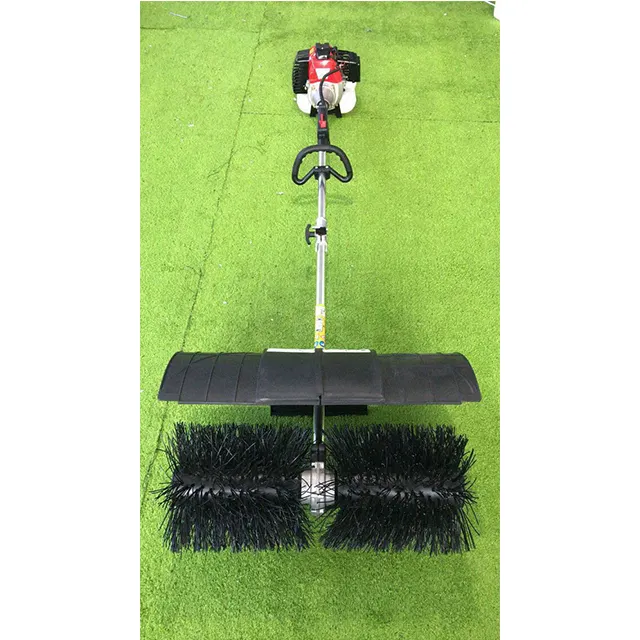 Balayeuse à main à deux temps portable à essence équipement de peignage de pelouse dispositif de nettoyage des déchets de pelouse artificielle