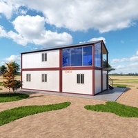 Maison conteneur modulaire préfabriquée à deux étages, démontable, moderne, portable, en kit, avec toit en pente, prête à être expédiée