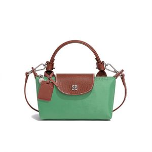 Minnie Hew Style Fashion Macaron Nylon Bag Exquisito Compact Tote Bolsos para mujeres Casual Hundred Shoulder Crossbody Bag - Product Image 6