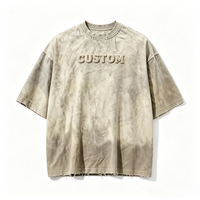 T-shirt en coton OEM pour la vente en gros, coupe carrée, effet délavé par pulvérisation, style streetwear, coupe oversize, effet délavé soleil, avec motif graphique 3D et lettres, couleur sauge