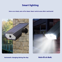 Projecteur solaire LED de sécurité avec détecteur de mouvement et caméra de surveillance factice pour résidence