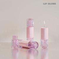 Nouveau Style en gros 2in1 8.3ml Logo personnalisé mignon Unique forme ronde rose clair blanc vide brillant à lèvres Tubes