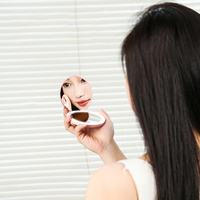 Miroir de maquillage portable pliable avec éclairage LED grossissant 2X, rechargeable par USB, personnalisable en gros