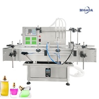 Machine de remplissage automatique de liquides à 4 têtes pour jus, vin, huile comestible, essence, eau minérale en bouteilles de verre