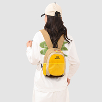 Sac à dos design pour femme en nylon, petit sac à dos décontracté color block, panneaux contrastants, bretelles zippées, pour l'extérieur