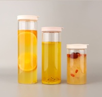 Bouteilles d'eau en verre de luxe, bocaux en verre personnalisés 75ml 250ml 500ml avec couvercle en silicone coloré et hermétique pour usage domestique OEM ODM