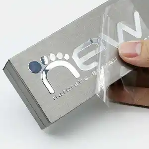 Pegatina de logotipo personalizado para caja de embalaje Electroform Nickel Metal Logo con pegamento para la industria de impresión de embalaje