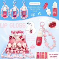Huile à lèvres hydratante et brillante à changement de couleur Gourd, kit d'échantillons de gloss à lèvres deux pièces, export transfrontalier, bracelet, grand pinceau