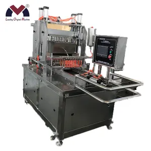 Machine pour fabriquer des boulettes, appareil de remplissage pour bonbons et confiseries