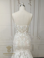 Robe de mariée sirène QUEENS GOWN avec corsage illusion, bretelles spaghetti et traîne florale spectaculaire