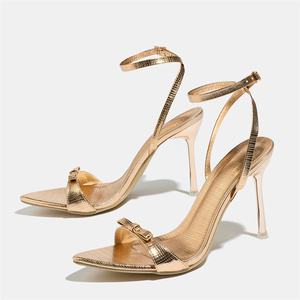 <span class=keywords><strong>Sandali</strong></span> Donna Oro Champagne con Tacco a Spillo, Motivo a Fiocco, Punta Affusolata e Cinturino alla Caviglia, Scarpe Eleganti <span class=keywords><strong>da</strong></span> Festa - Product Image 1