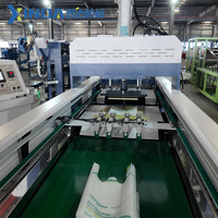 Machine de fabrication de sacs en non-tissé entièrement automatique à découpe en W, contrôlée par PLC, entraînée par moteur et moteur électrique, haute vitesse, pour sacs T-shirt et sacs de courses réutilisables