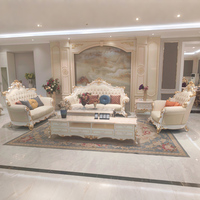 Ensemble de canapés en cuir véritable en bois massif de style européen, luxe haut de gamme, salon, villa, grand appartement, pieds en feuille d'or blanc brillant