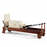 Ensemble d'équipements de Pilates en bois de noyer à cinq pièces avec Reformer Cadillac pour salle de sport commerciale