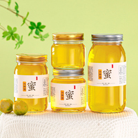 Bouteille d'emballage de miel en verre vide 250g 500g Prix bon marché Pot en verre personnalisé Pot de miel Bouteille d'emballage vente en vrac