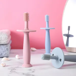 Toothbrush do treinamento do bebê do silicone do produto comestível Toothbrushes do bebê do movimento 360 graus para crianças com base da sucção