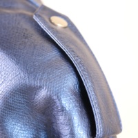 Jaket kulit PU wanita, jaket kulit PU biru Bias pita ritsleting dengan sabuk gesper ganda pola Solid dekorasi kancing gaya pengendara sepeda motor wanita