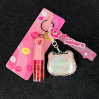 Porte-clés chaîne suspendu, Huile à lèvres hydratante, Gloss à lèvres, Ensemble de soin illuminateur avec Miel format voyage pour tous types de peau