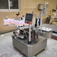 Étiqueteuse de bouteilles semi-automatique pour dispositif d'étiquetage de pot de pot en plastique collant la cruche de boîtes cosmétiques