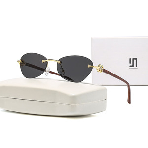 Nouvelles lunettes de soleil œil-de-chat sans monture en métal pour femmes, protection UV400, verres noirs en PC, monture tendance - Product Image 2