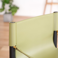 Chaises de salle à manger de luxe modernes avec selle de cheval Coussins en cuir Design en bois pour hôtels cafés écoles