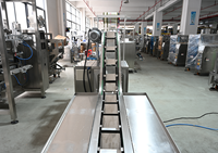 Machine d'emballage verticale semi-automatique pour fruits secs (prunes), nouilles fraîches et biscuits, avec film enrouleur vertical et fonction de remplissage