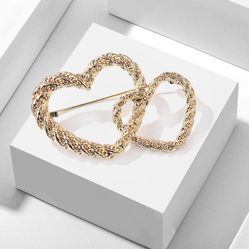 Broche double cœur Goldxz4296