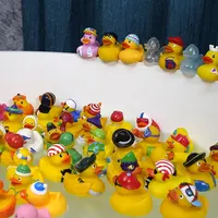 Custom Plastic Toy Animal Weighted Floating Race Assorted Black Printed Rubber Ducky Bulk Bathtub Squeaky Bath Duck Promotional