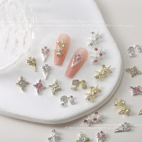 Paso Sico Accessoires de Nail Art de Luxe en Alliage et Strass Ultra-Brillants, Motifs Croix, Fleur, Étoile, Tête de Poupée, 10 Pièces