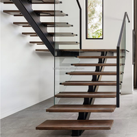 Escaliers flottants d'intérieur modernes avec garde-corps en verre Mono Stringer invisible durable pour la conception de structure en bois de hall d'utilisation d'appartement