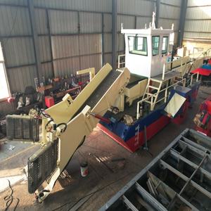 Rivierreinigingsmachine verzamelt drijvend afval, maait waterplanten en snijdt riet. - Product Image 4