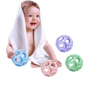 Factory wholesales Silicone Ball Teether Food Grade Silicone Baby Teething Rattle Toy Ball Massage Gums Hands Grab Ball
