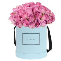 Vente en gros de boîte cadeau d'emballage de fleur rigide noire en papier de carton rond de luxe personnalisé avec ruban