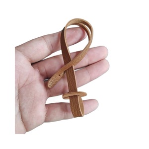 Stylish and minimalist PU leather lanyard keychain, belt <b>bag</b> <b>charm</b>, niche PU leather rope doll accessory. - Product Image 3