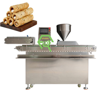 Machine à gaufrettes à haute capacité avec système de dosage pour garniture au lait concentré et crème, et déposeur de crème au chocolat