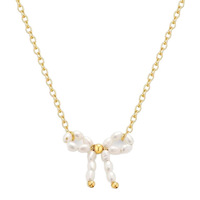 Collier de luxe en cuivre avec nœud papillon et perles d'imitation, design unique, sensation haut de gamme, tendance et polyvalent pour femme