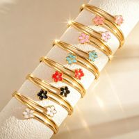Bracelet jonc tendance en acier inoxydable plaqué or 18 carats avec double fleur émaillée colorée pour femme - Vente en gros