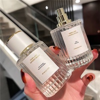 Flacon de parfum en verre de haute qualité de 50 ml, fond épais, cylindrique, vertical, avec bouchon à vis, pulvérisateur, sérigraphie
