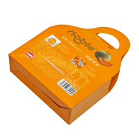 Boîte en carton orange avec fenêtre et poignée, personnalisée avec logo en feuille d'or, pour emballage de melon Hami brillant, découpée avec poignée