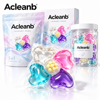 5-en-1 : Capsules de lessive écologiques jetables en forme de cœur, parfum longue durée, perles parfumées, OEM ODM, couleur personnalisée