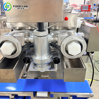 Machine à encruster industrielle automatique pour la production de snacks fourrés